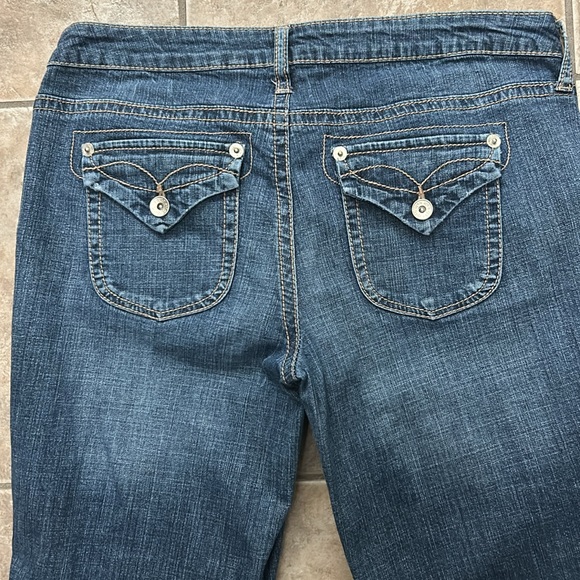 Dark mid rise boot cut jeans with asymmetrical outside hem size 8 - Picture 5 of 5